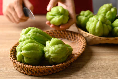 Chayote squash fruit in basket prepare for cooking, Organic vegetables