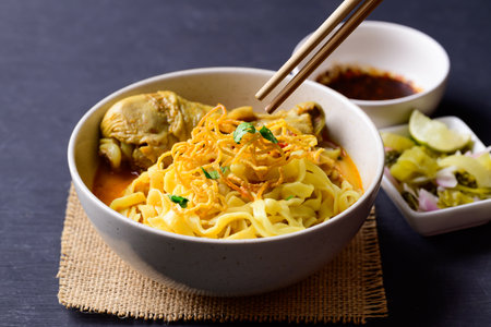 Northern Thai food (Khao Soi), Spicy curry noodles soup with chicken, Local Thai foodの写真素材
