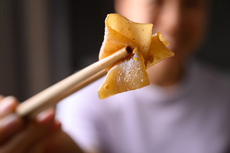 Thai food (Pad See Ew), Stir fried rice noodles soy sauce eating by chopsticksの写真素材