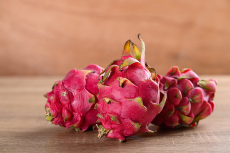 Red dragon fruit or pitaya on wooden background, Tropical fruit in summer seasonの写真素材