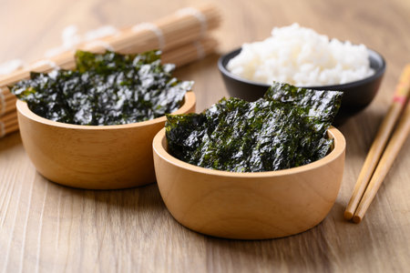 Dried seaweed sheet eating with rice, Asian foodの写真素材