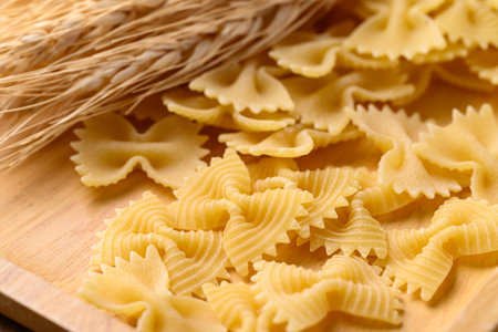 Uncooked farfalle pasta (bow tie shape), Italian food ingredient