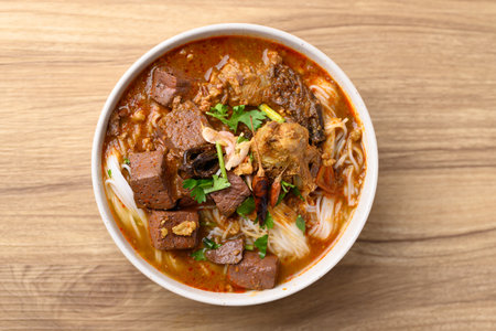 Northern Thai food, Spicy rice noodles soup with pork eating with fresh vegetables, Local Thai food