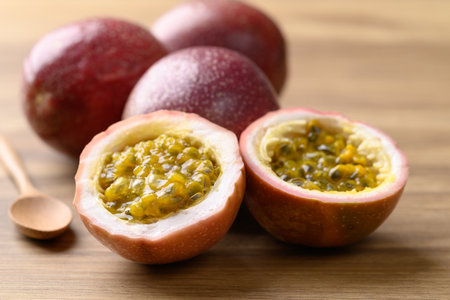 Fresh passion fruit on wooden background, Tropical fruitの写真素材