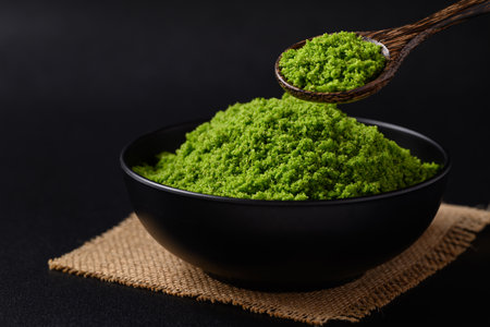 Wolffia or watermeal on black background, Healthy edible small aquatic plant high protein and fiberの写真素材