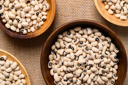 Black-eyed pea or cowpea in wooden bowl, Food ingredient, Top viewの写真素材