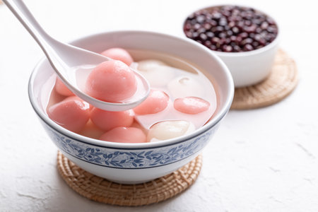 Tangyuan (Chinese sweet dumpling), Glutinous rice ball in syrup, Dessert celebrated in mid autumn lantern festival or new yearの写真素材