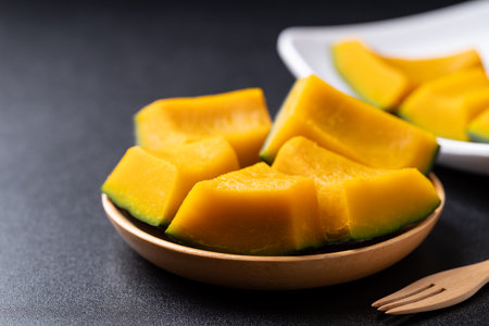 Steamed Japanese pumpkin or Kabocha on plate ready to eating, Healthy foodの写真素材