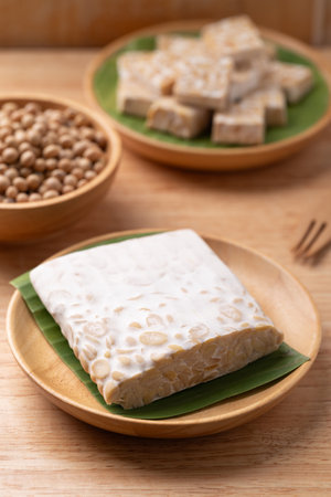 Tempeh made from fermented soybeans, Traditional Indonesian food, Healthy vegan and plant based ingredientsの写真素材
