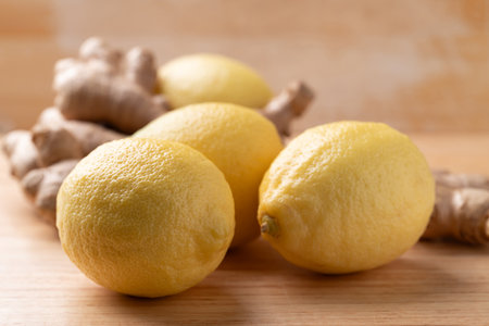 Fresh lemon and ginger on wooden backgroundの写真素材