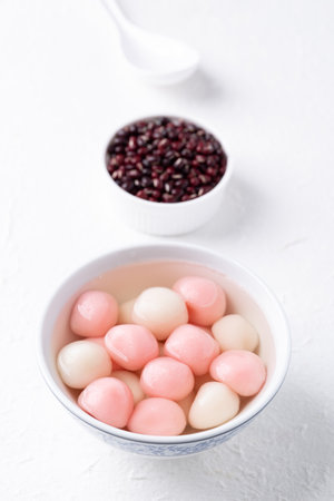 Tangyuan (Chinese sweet dumpling), Glutinous rice ball in syrup, Dessert celebrated in mid autumn lantern festival or new yearの写真素材