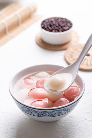 Tangyuan (Chinese sweet dumpling), Glutinous rice ball in syrup, Dessert celebrated in mid autumn lantern festival or new yearの写真素材