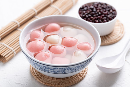 Tangyuan (Chinese sweet dumpling), Glutinous rice ball in syrup, Dessert celebrated in mid autumn lantern festival or new yearの写真素材