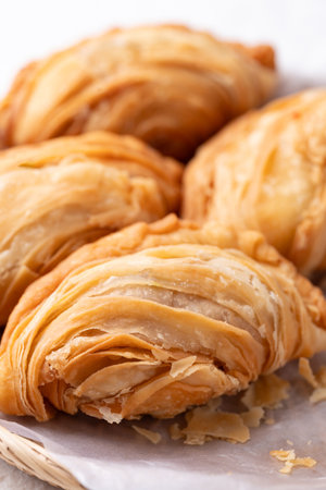 Curry puff stuffed with chicken or sweet potatoes, Thai snack food styleの写真素材