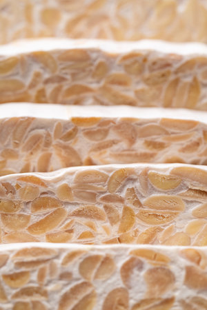 Tempeh texture background, Traditional Indonesian food, Healthy vegan and plant based ingredients