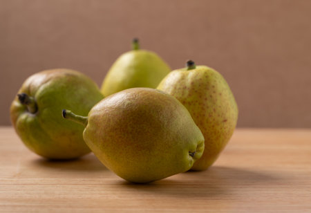Fresh pear on wooden backgroundの写真素材