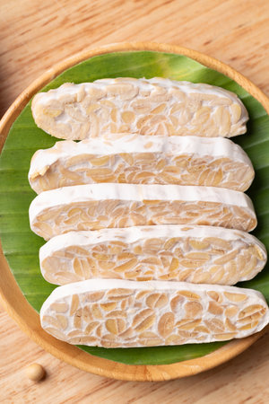Tempeh made from fermented soybeans, Traditional Indonesian food, Healthy vegan and plant based ingredientsの写真素材
