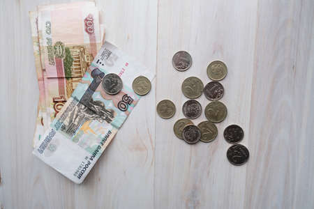 Russia money background. Heap of rubble banknotes. Currency top view. Money background with close up of russian Ruble A lot of Russian rubles. Iron money. Finance, business, investment concept.の写真素材