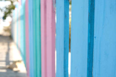 A bright and colorful fence in a kindergarten.の写真素材