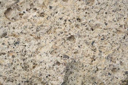 Marble stone background. Fragment of a stone wall. High quality photo