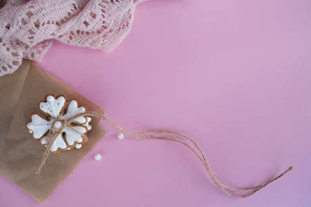 Delicious homemade Christmas cookies in the shape of a snowflake on a pink background. High quality photoの写真素材