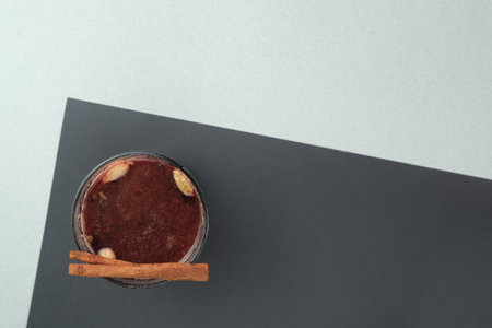 Delicious mulled wine on a black table, flat lay. Place for text. High quality photoの写真素材