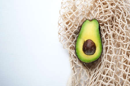 Avocado close-up. Natural fresh organic exotic fruits. Healthy food, raw food diet. Vegetarian...
