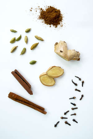 Creative layout made of masala tea on white background. View from above. Indian drink. High quality...