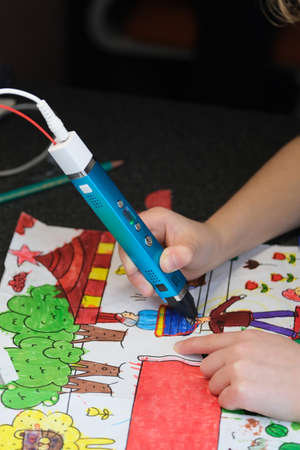 The girl uses a 3D printed pen. Creative, leisure, Creative, leisure technological education....