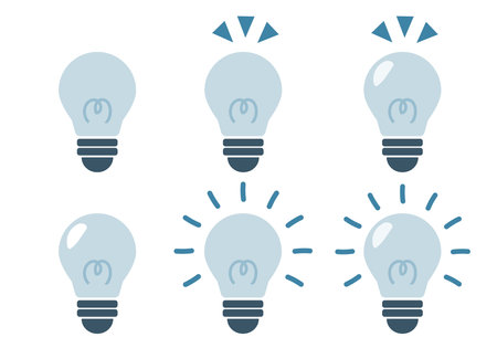 Set of lightbulb icons. Vector illustration in flat style. Illustration of a light bulb glowing with a flashing imageのイラスト素材
