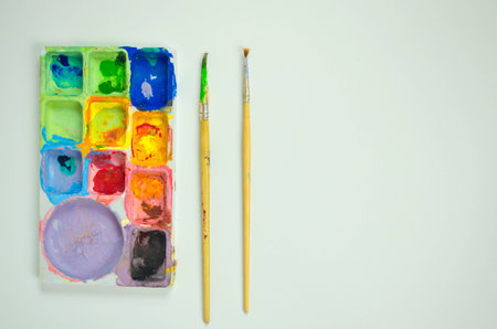 Palette and Paintbrush.