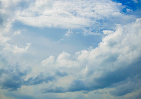 The white clouds and blue sky in the daytime.の写真素材