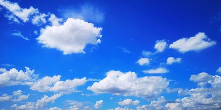 Beautiful blue sky and clouds background on sunshine day.