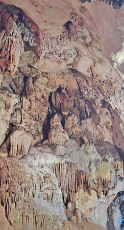 Stunning Stalactite and Stalagmite Formations Inside Majestic Limestone Cave Interior