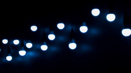 Open Light bulb on black backgroundの写真素材