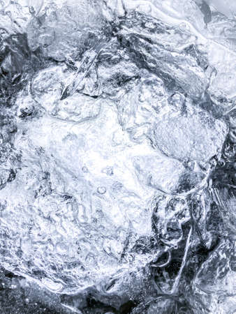 Abstract Ice background, Ice cubes feel fresh on hot days, Ice is indispensable in summer. It will help refresh and make you feel good.の写真素材