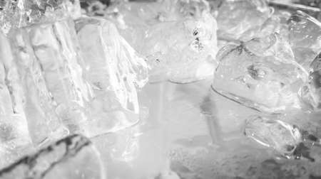 The ice cube shape has been adjusted to add color,It will help refresh and make you feel good. Ice backgroundの写真素材