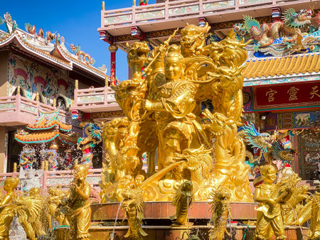 Ang Silla,Chonburi,Thailand -  January 14,2023: Naja statue golden is a beautiful Thai and Chinese architecture of Nachas sa thai chute shrine, naja shrine, najasaataichue, nezhaのeditorial素材