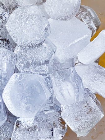 Ice cubes background, ice cube texture or background It makes me feel fresh and feel good, In the summer, ice and cold drinks will make us feel relaxed, Made for beverage business.の写真素材