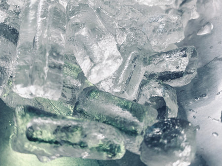 Ice cubes background, ice cube texture or background It makes me feel fresh and feel good, In the summer, ice and cold drinks will make us feel relaxedの写真素材