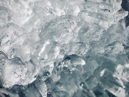 Ice cubes background, ice cube texture or background It makes me feel fresh and feel good, In the summer, ice and cold drinks will make us feel relaxedの写真素材