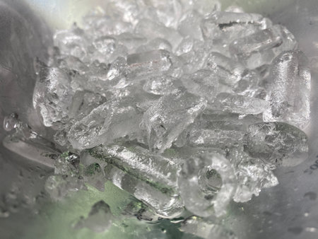 Ice cubes background, ice cube texture or background It makes me feel fresh and feel good, In the summer, ice and cold drinks will make us feel relaxedの写真素材