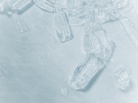 Ice cubes background, ice cube texture, ice wallpaper It makes me feel fresh and feel good. In the summer, ice and cold drinks will make us feel relaxed,Made for beverage businessの写真素材