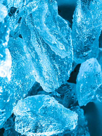 Ice cubes background, ice cube texture, ice wallpaper It makes me feel fresh and feel good. In the summer, ice and cold drinks will make us feel relaxed, Made for beverageの写真素材