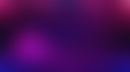 A smooth gradient background blending deep purple and magenta hues with a soft, abstract texture.の写真素材