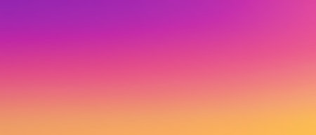 A smooth gradient blending pink, purple, orange, and yellow hues, creating a vibrant and warm abstract background.の写真素材
