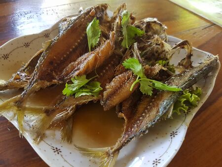 Fried mackerel with fish sauceの写真素材