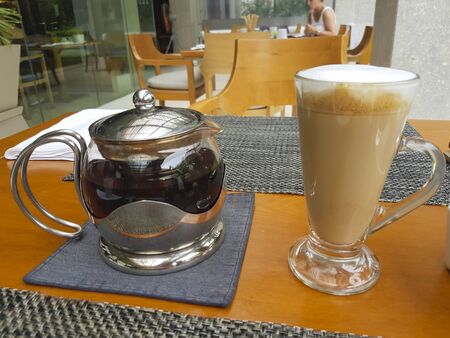 Hot cappuccino coffee and hot teaの写真素材