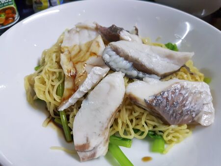 Egg noodle and boiled snapperの写真素材