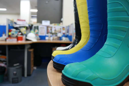 Colorful rubber boots. Shallow depth of field.の写真素材